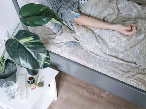 A patient resting in bed after an operation