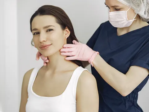 The thyroid felt at the front of a woman's neck