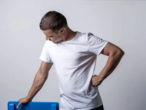 A man with pain in his side, at the kidney
